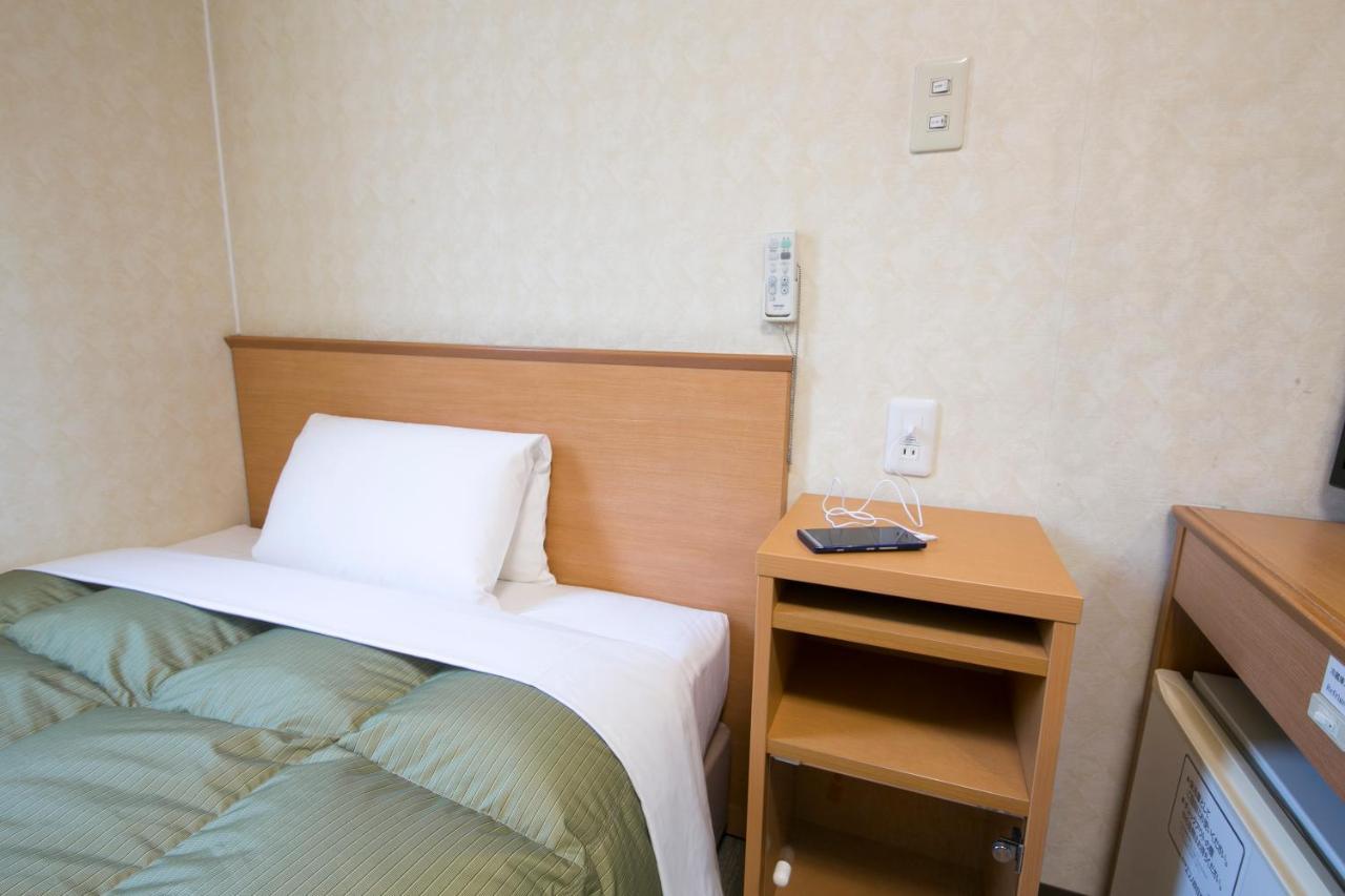 Hotel Econo Йоккаити Экстерьер фото
