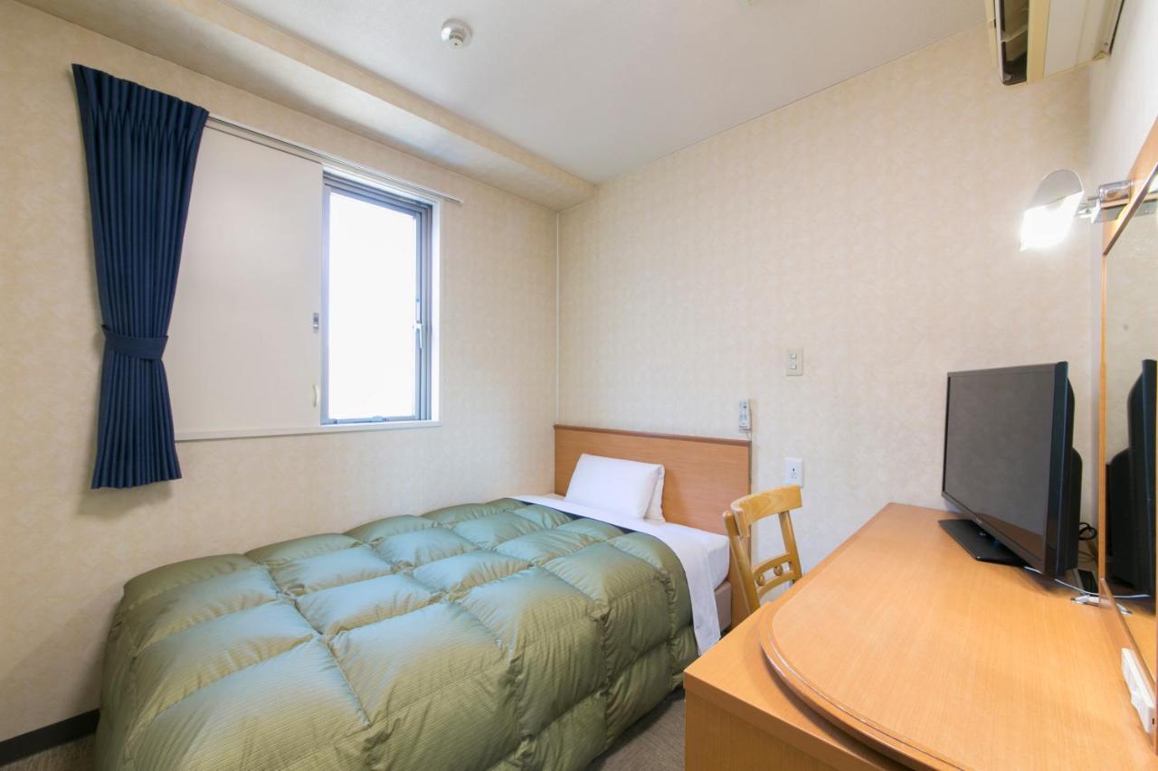 Hotel Econo Йоккаити Экстерьер фото