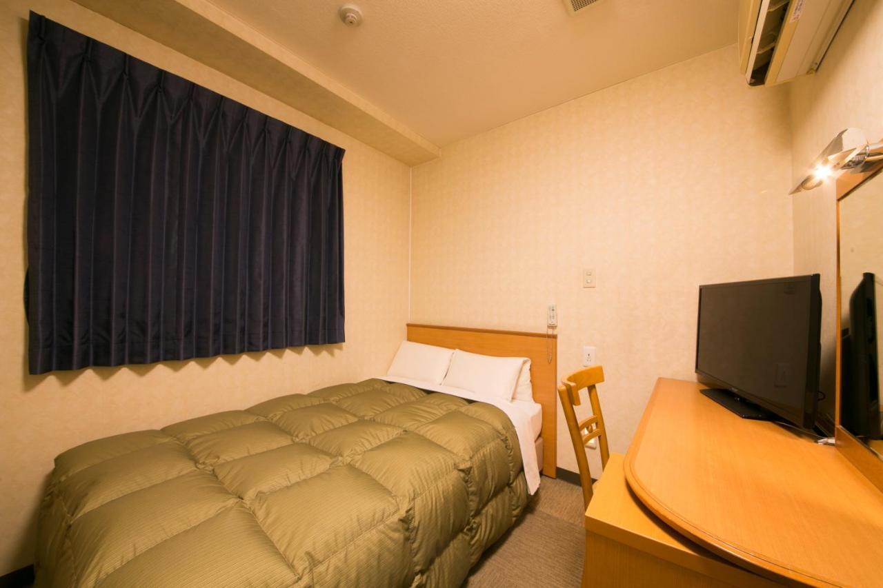 Hotel Econo Йоккаити Экстерьер фото